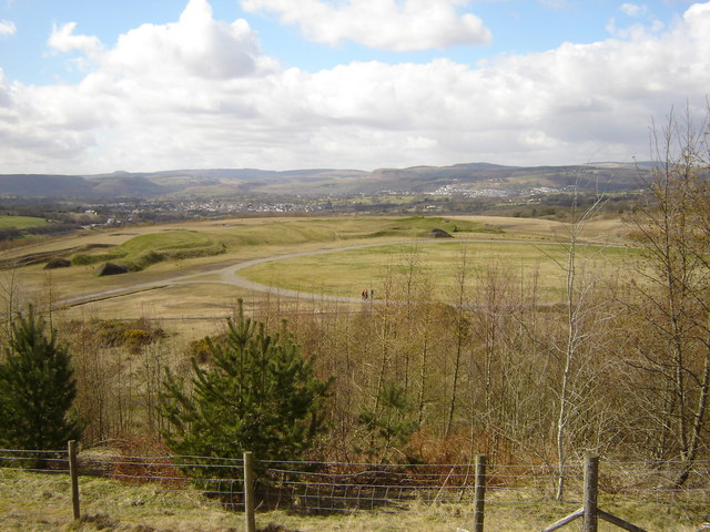 The grassed earth sculpture of a leaping pit pony at Parc Penallta, raised from the colliery's coal shale.