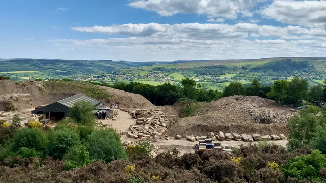 Cut sandstone faces and worked ground at the quarry on the hill above Aislaby, west of Whitby