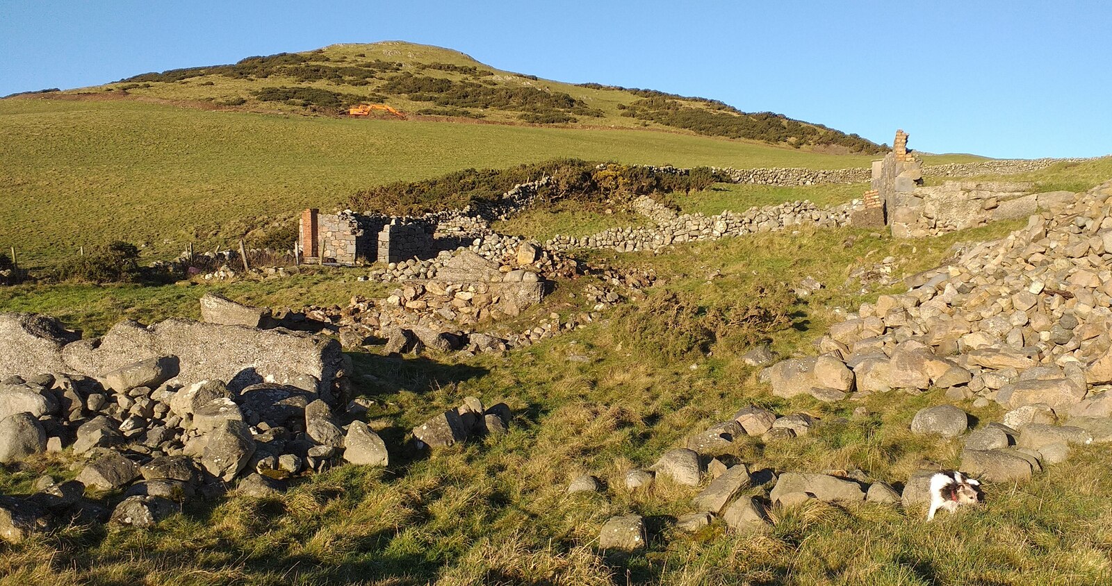 The abandoned surface remains of Auchencairn Mine above Rascarrel Bay.