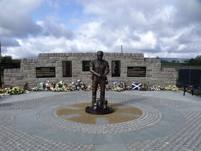 The bronze miner's memorial at Bridgend, Moodiesburn, commemorating the 47 men killed in 1959.