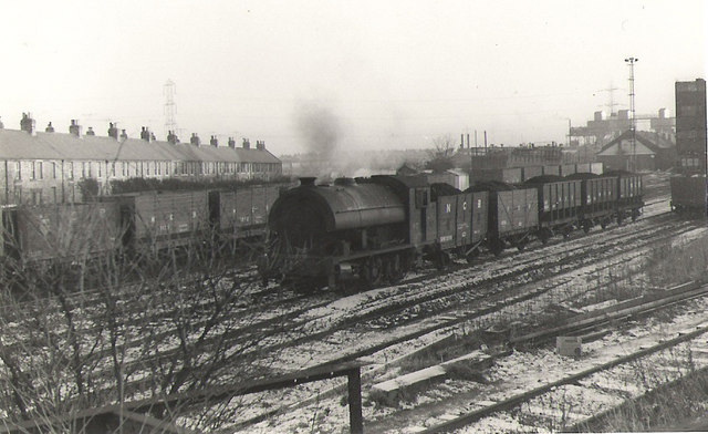 A National Coal Board locomotive assembling a loaded coal train in the yard north of Backworth colliery in 1970.