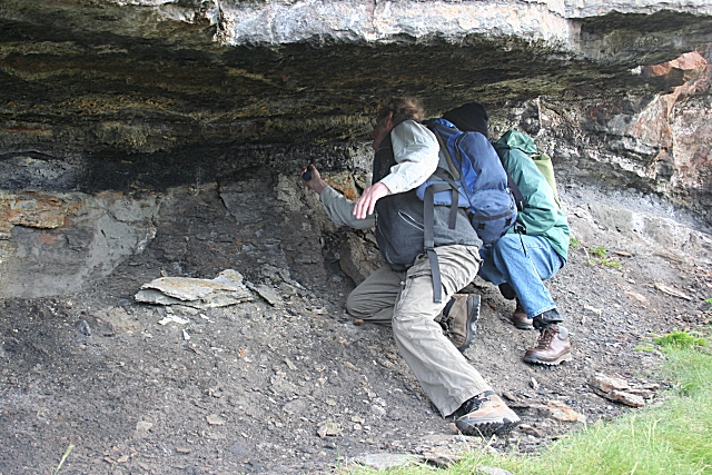 The remnant of a coal seam in the cliff along the shore three kilometres from Ballycastle, with limestone beneath it