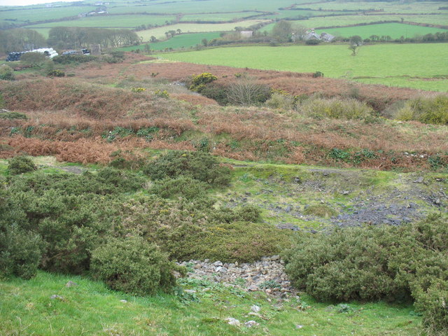 The abandoned Benallt manganese mine on the coastal slopes at Rhiw, with ruined buildings and spoil.