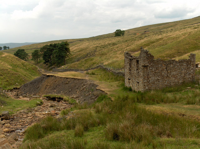 The eroded banks of Garrigill Burn at Bentyfield Mine, Alston Moor.