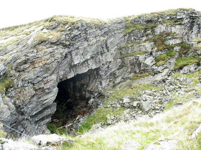 A large chamber exposed within the quarry's pit walls, photographed among the abandoned workings.