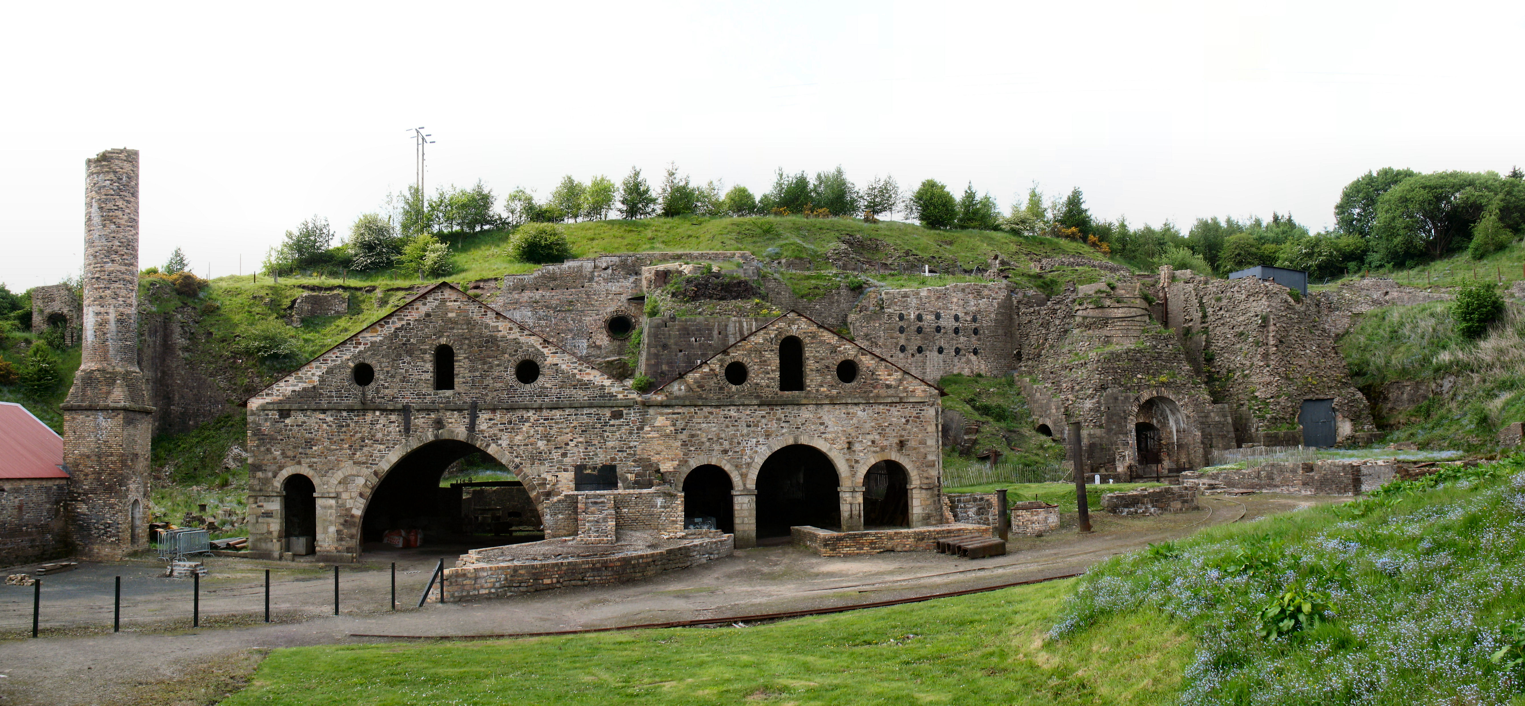 The stone ruins of the blast furnace structures at Blaenavon Ironworks, part of the Blaenavon Industrial Landscape World Heritage Site