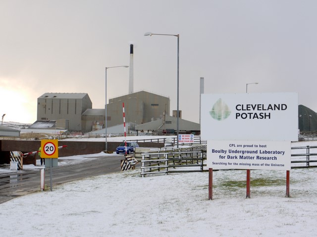 A sign reading "No WIMPs here" at the entrance to Boulby Mine, a wry reference to the Weakly Interacting Massive Particles (WIMPs) the mine's underground dark-matter laboratory searches for.
