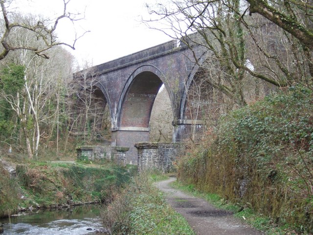 The disused railway viaduct at Cann Quarry, now carrying the Plym Valley cycle trail; the bridge is also an RSPB viewpoint for the peregrine falcons nesting in the old quarry face.