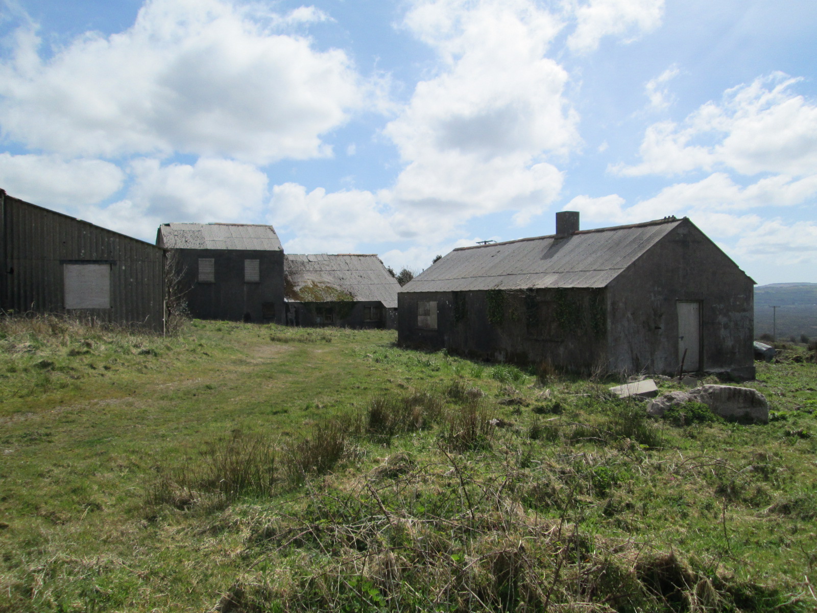 Surviving wolfram mine buildings at Castle-an-Dinas, beneath the hillfort ramparts.