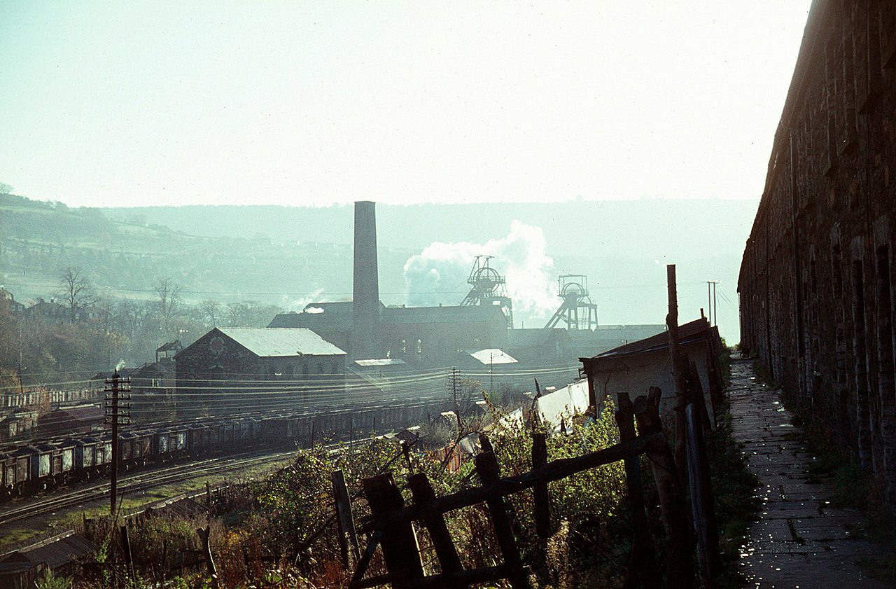 Celynen South Colliery, Abercarn, photographed while still operating in 1969, with a terrace of miners' housing in the foreground.