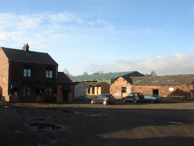 A red-brick farmhouse and outbuildings at Cleworth Hall Farm, Tyldesley, on the estate under which the colliery was sunk.