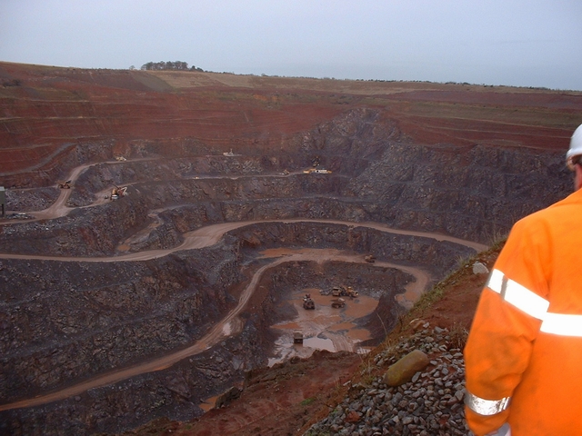 A deep worked quarry face at Cliffe Hill Quarry, Stanton under Bardon, where basalt/syenite is extracted for aggregate