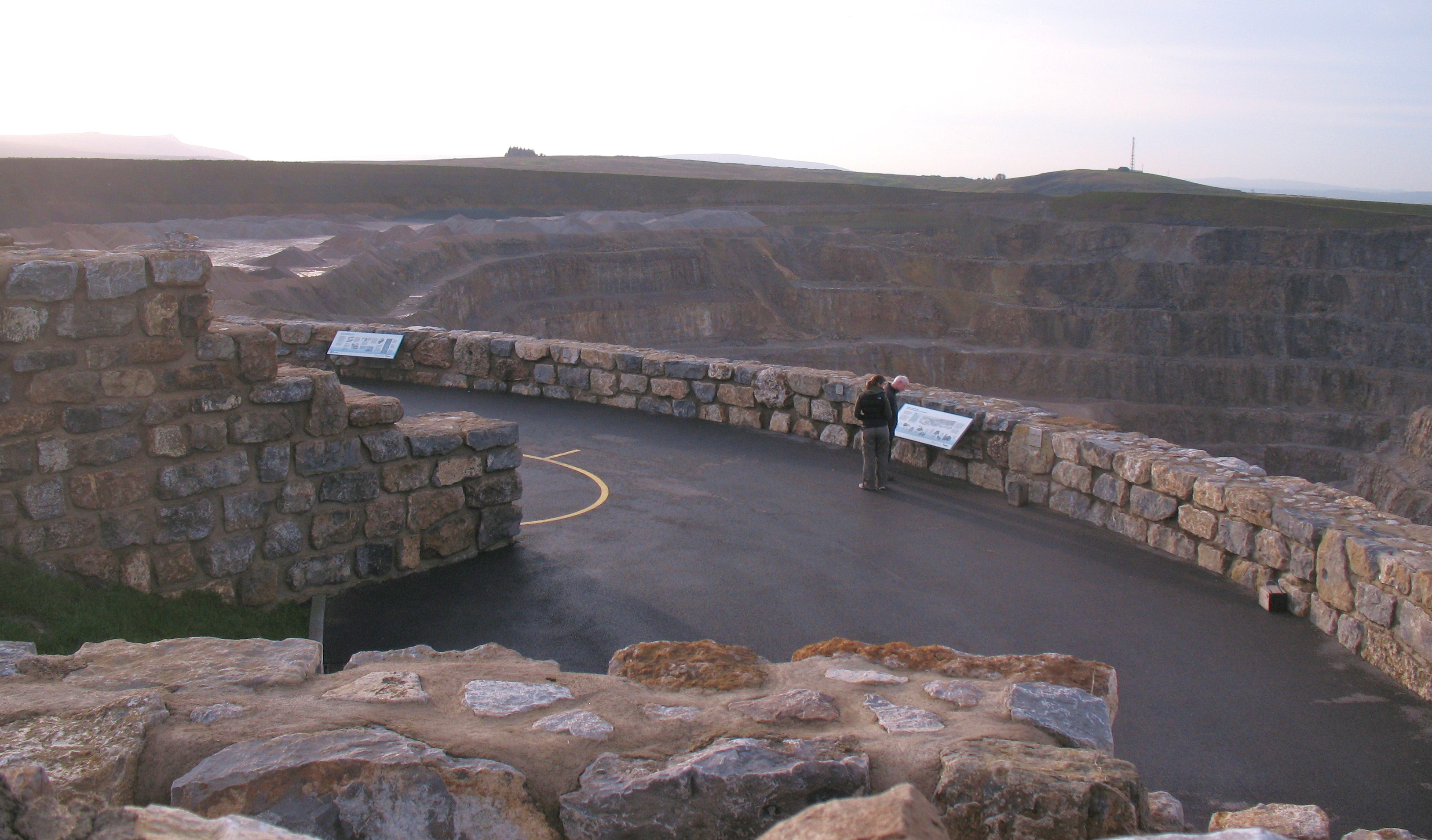 The stone-built Coldstones Cut walkway on the rim of Coldstones Quarry