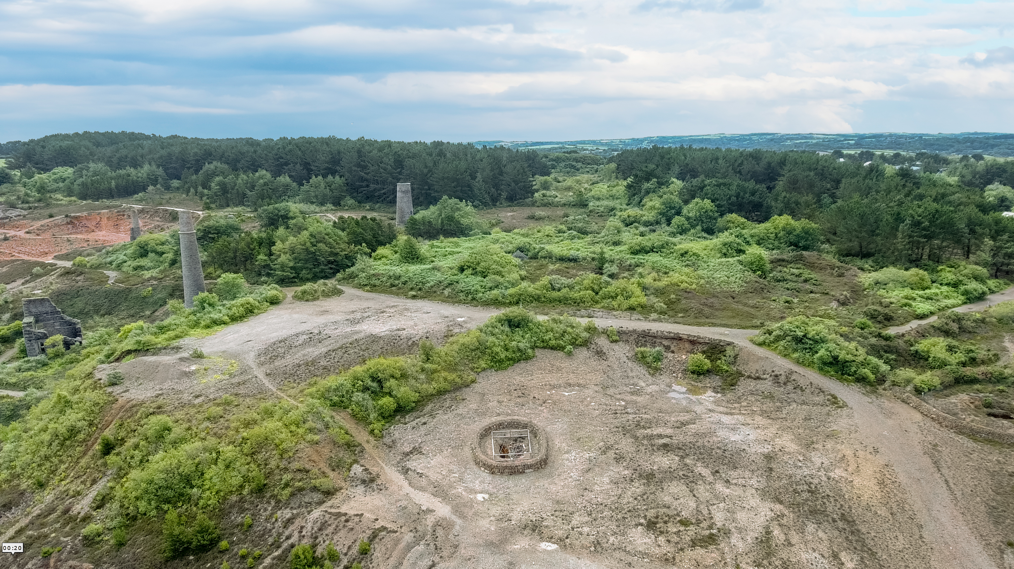 The clock tower and capped shafts at the former Wheal Maid site, part of Consolidated Mines.