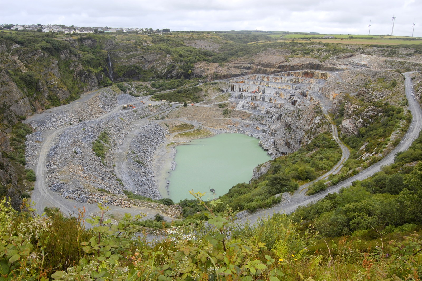 The great pit at Delabole, about 425 feet deep and a mile and a half around.