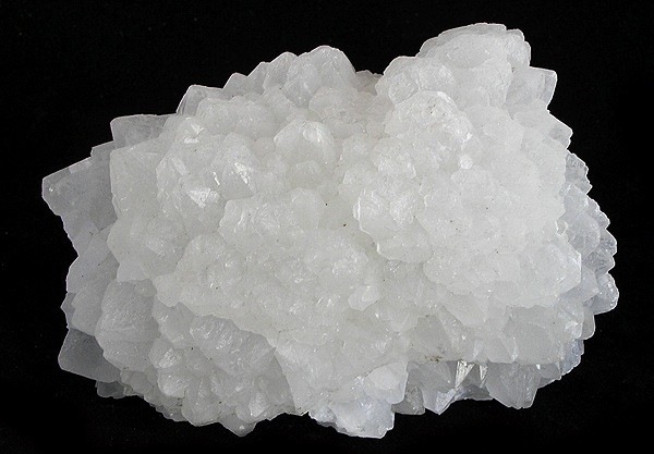 A cabinet specimen of massed frosty witherite crystals from Fallowfield Mine, about 10 cm across.