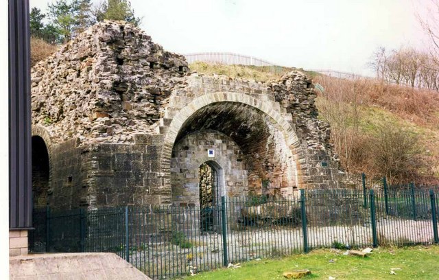 Ruined stone stack of a 19th-century blast furnace on the former Llynfi Ironworks site near Gin Pit.