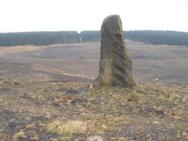 The large, grassed-over void left by opencast coal extraction on the site of the former Glenbuck village and colliery.