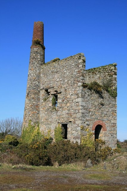The Grade II-listed Victorian pumping engine house at Read's Shaft, Hallenbeagle Mine, photographed beside the Redruth-Truro railway line.