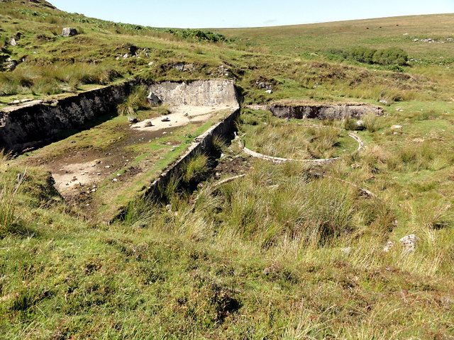 The circular remains of buddle pits at Hooten Wheals, used for separating milled tin ore from waste rock by sedimentation