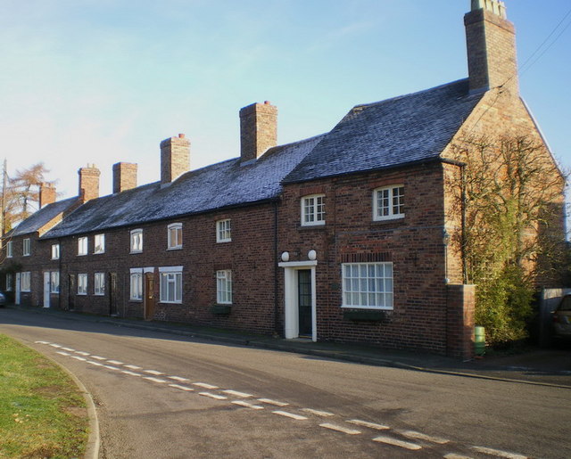 Former miners' cottages at Kemberton, with the tall chimneys that served several fireplaces.