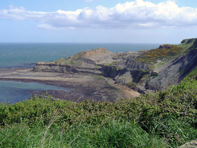 A view of Kettleness showing the disused alum quarries on the headland.