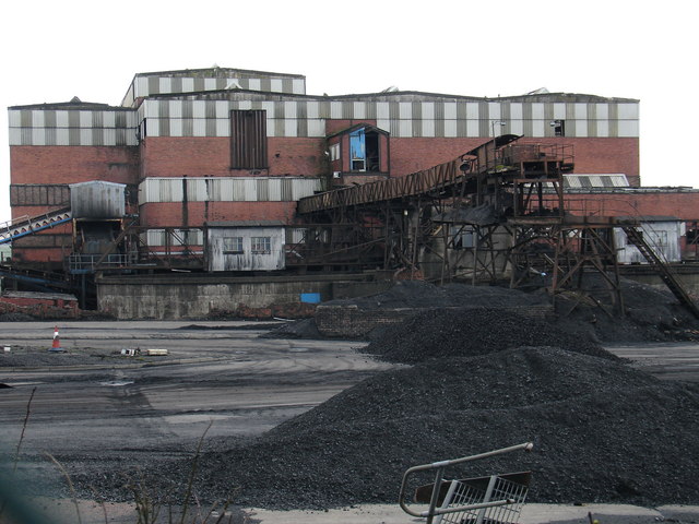 The former Killoch Colliery site, its winding gear and underground workings gone, later reused as a rail-served coal distribution depot.
