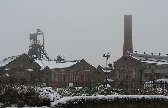 The surviving surface buildings of Lady Victoria Colliery under snow: the headstocks, winding engine house, chimney and power house of one of Europe's most complete Victorian collieries.