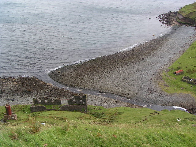 The ruined diatomite processing works at Invertote, Skye, with the trace of the old tramway up to Loch Cuithir visible on the hillside beyond.