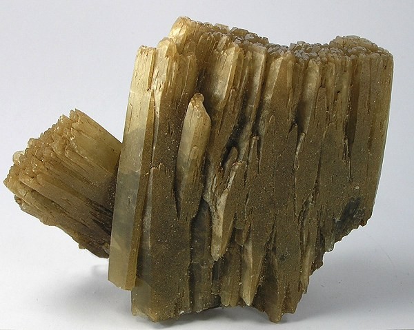 A glassy, terraced baryte crystal specimen recovered from Mowbray Mine, Frizington -- one of the mine's better-known mineral products.