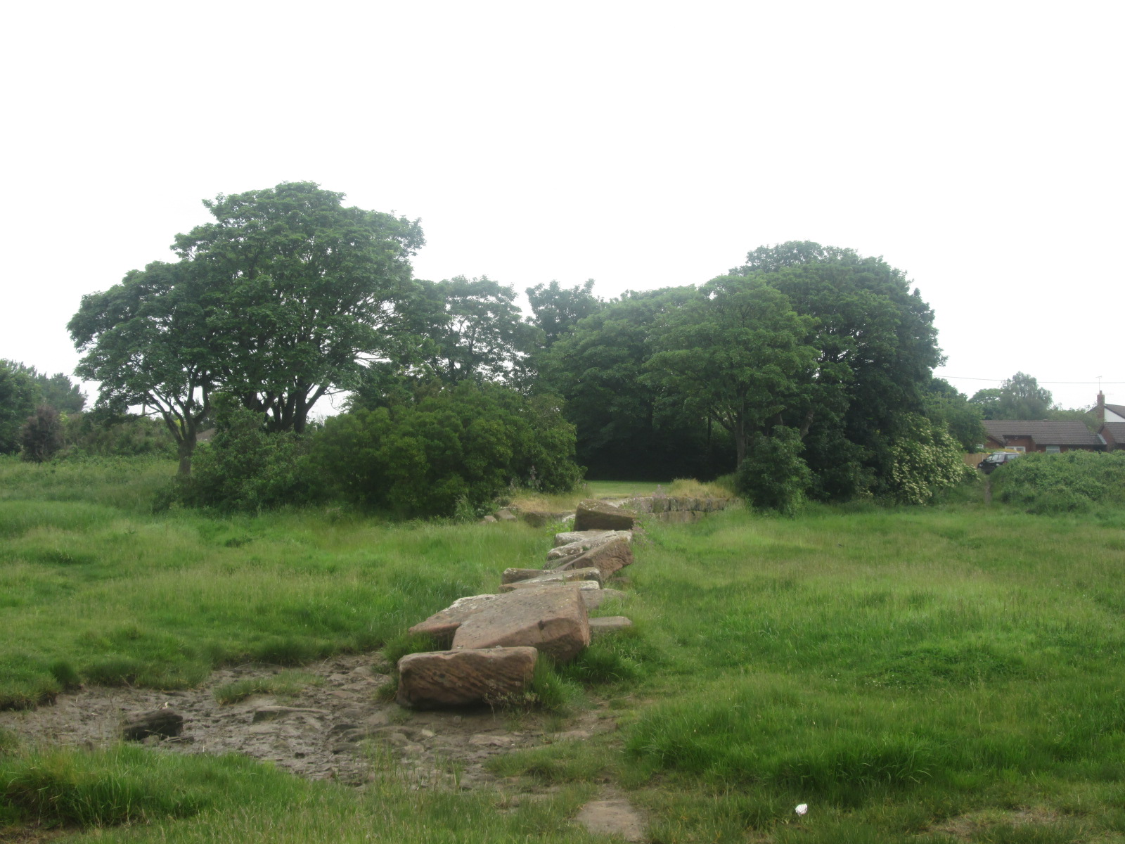 The derelict remains of Denhall Quay, built in 1791 to serve the earliest Neston colliery workings on the Dee Estuary.