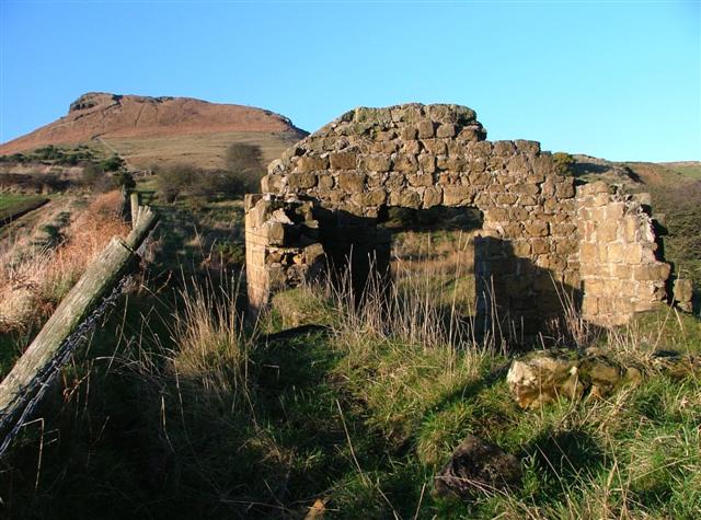 The ruined stone powder magazine at Roseberry Mine, built of local sandstone and set apart from the main workings, once used to store the black powder used by the mine's ironstone miners.