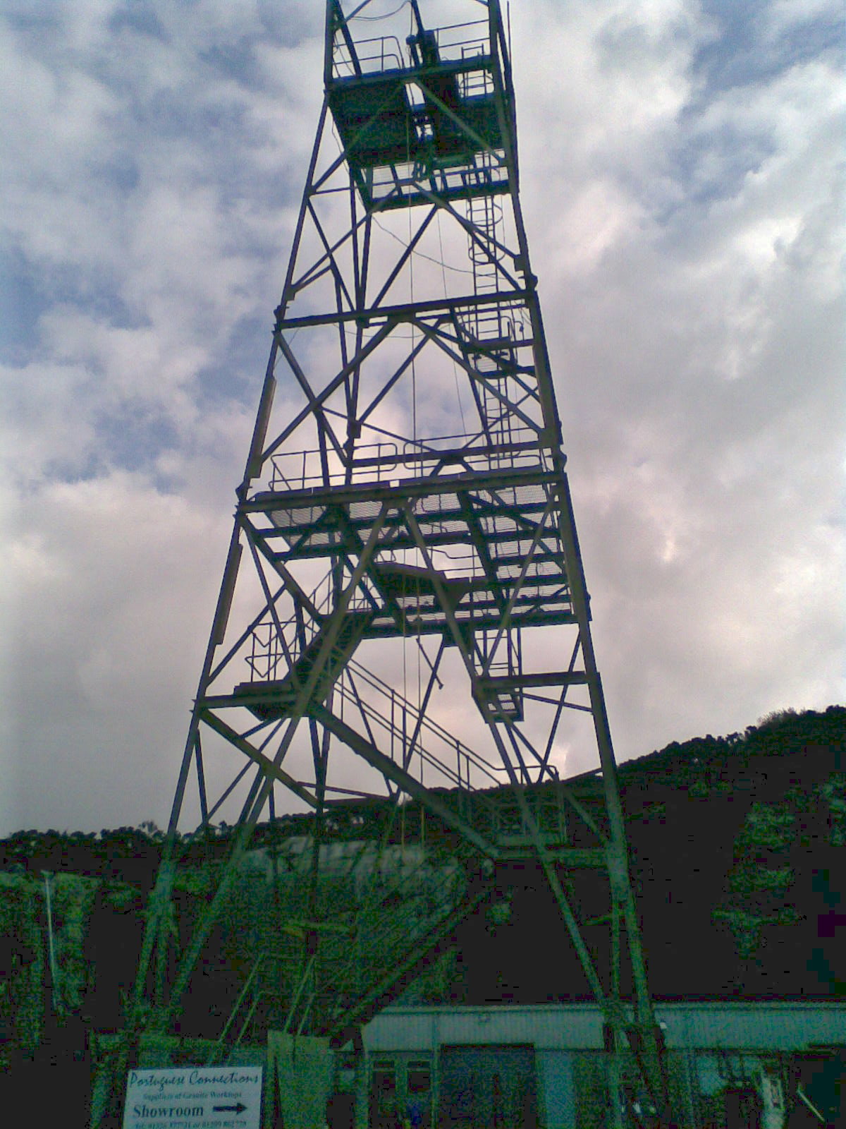 The steel drilling tower standing at Rosemanowes Quarry near Penryn, erected for the hot dry rock geothermal project that drilled deep wells into the Carnmenellis granite