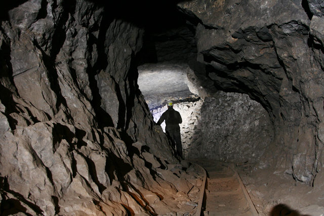 A wide, rubble-strewn underground passage in Smallcleugh lead mine, Nenthead, showing the scale of the historic workings