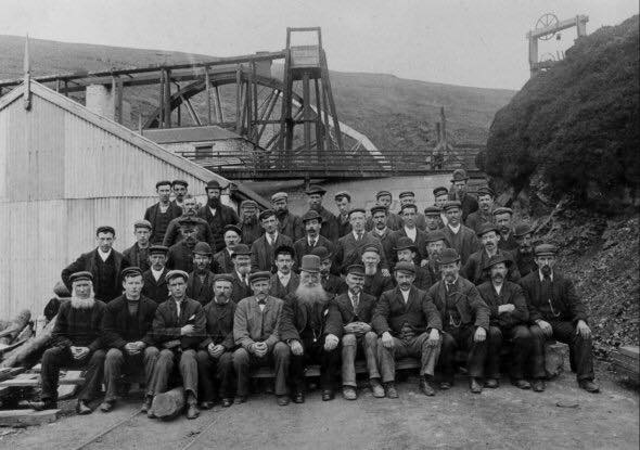 A group photograph of the miners employed by the Great Snaefell Mining Company, taken on 5 July 1897, less than two months after the disaster that killed 20 of their colleagues.