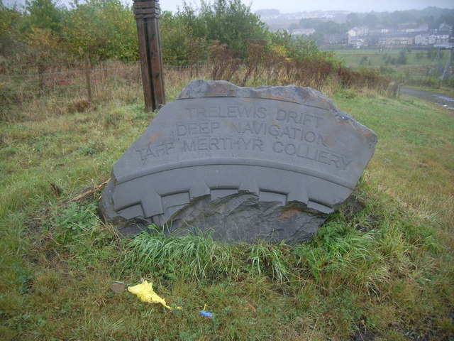 A commemorative stone marking the entrance to the former Taff Merthyr Colliery and Trelewis Drift site.