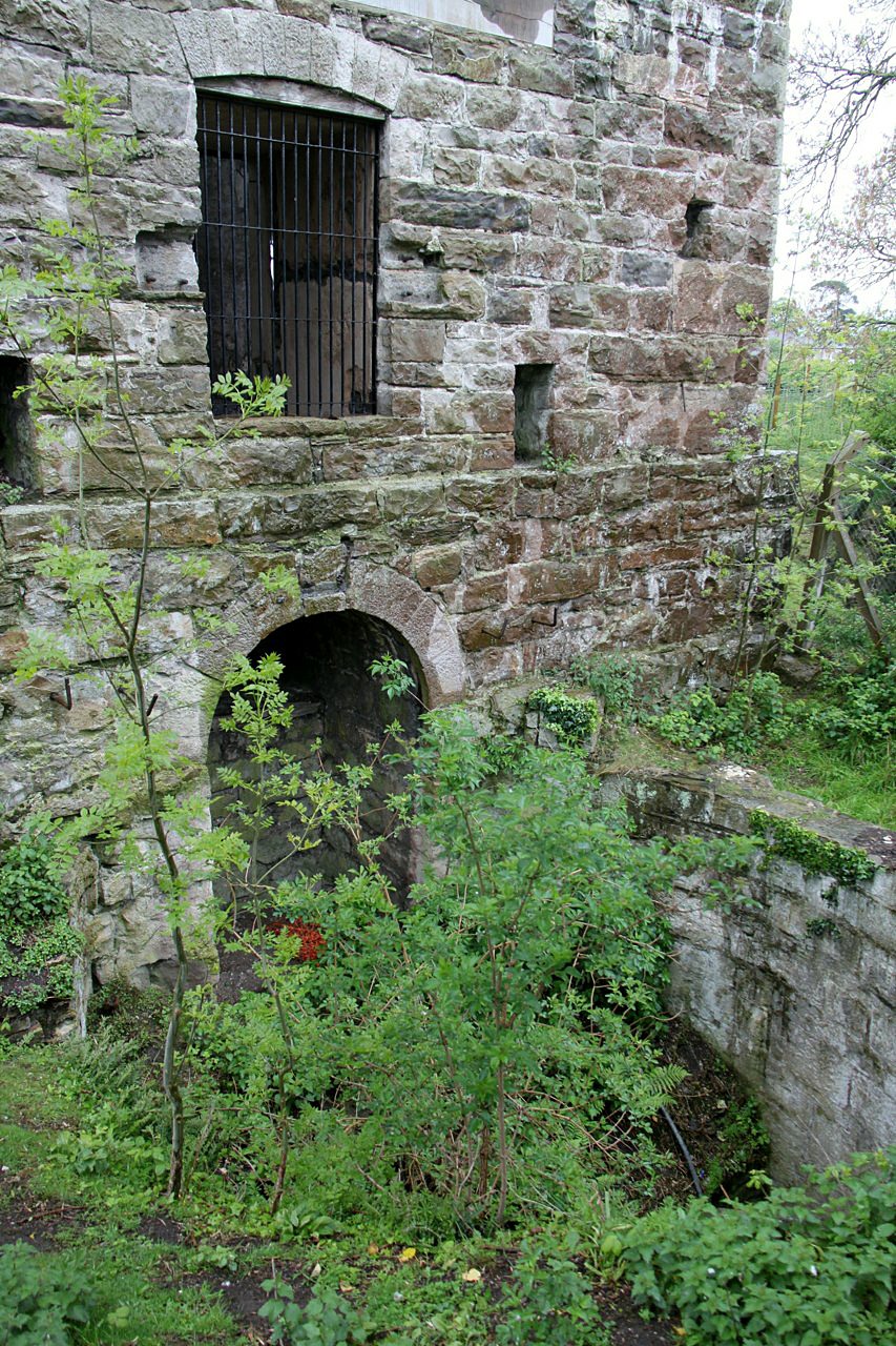 The derelict stone engine house at Clive Shaft, Talargoch Mine, Dyserth — a Grade II listed building and scheduled monument.