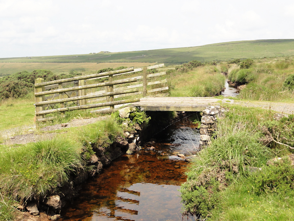 A stone bridge over one of the leats that once powered Wheal Friendship mine, near Mary Tavy, Devon.