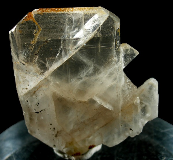 A specimen of water-clear tabular celestine crystals with hematite from Yate Quarry, about 5 cm across.