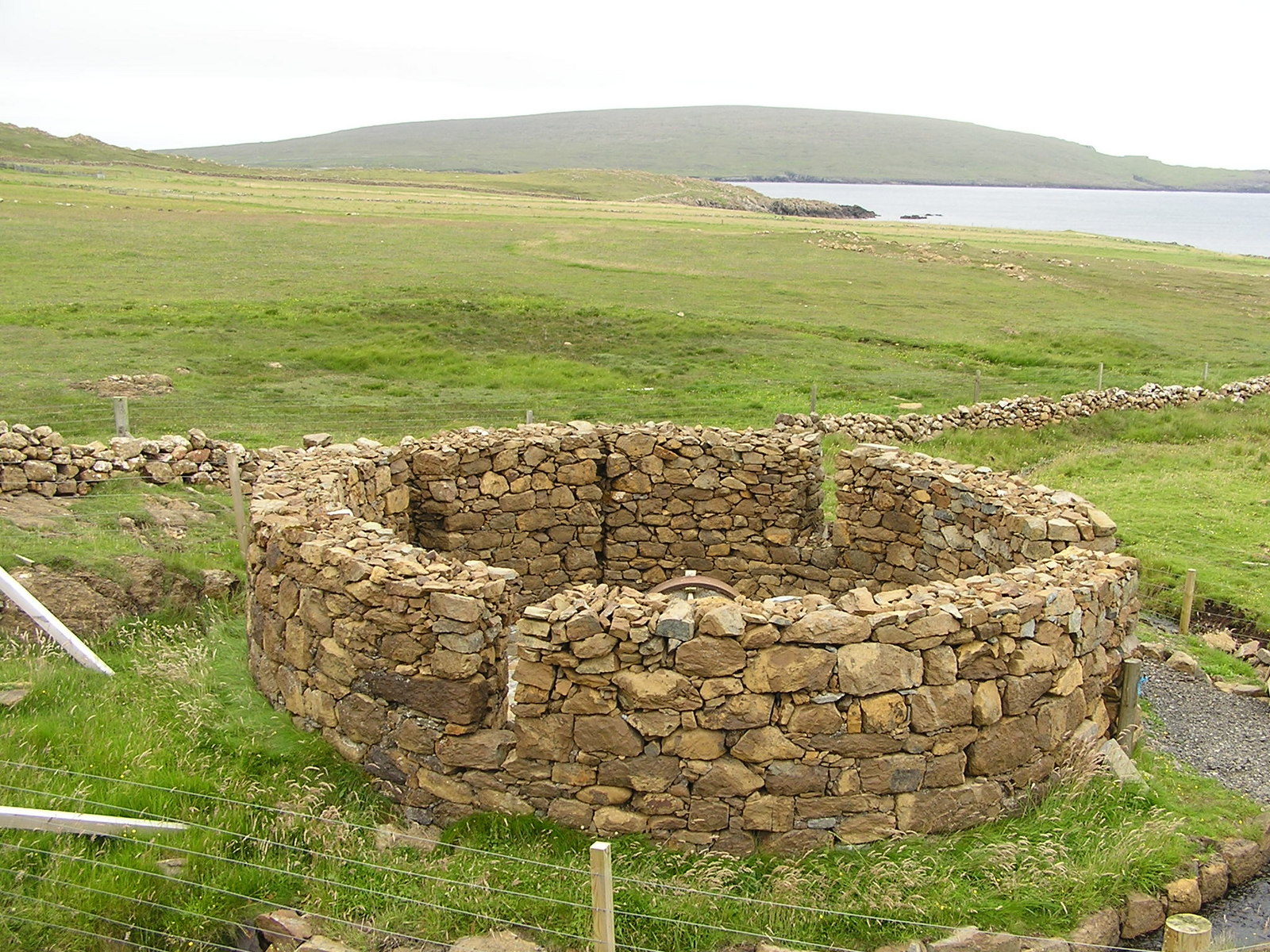 The restored horse-powered chromite crushing mill at Hagdale, Unst — the last surviving example of its kind in Britain.