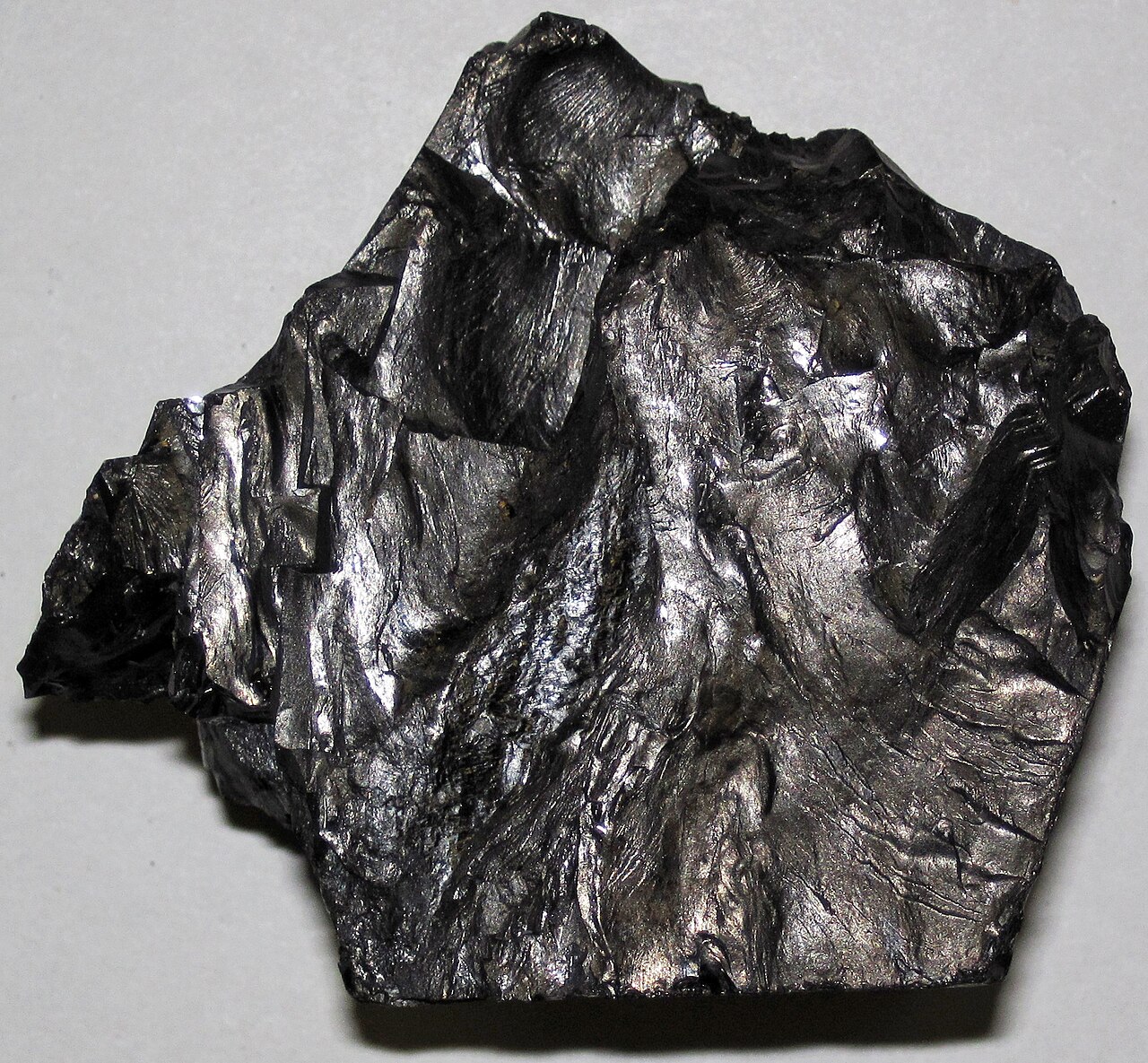 A specimen of anthracite coal — hard, glossy and up to 97% carbon, the same high-rank coal Hook Colliery in Pembrokeshire was worked for.