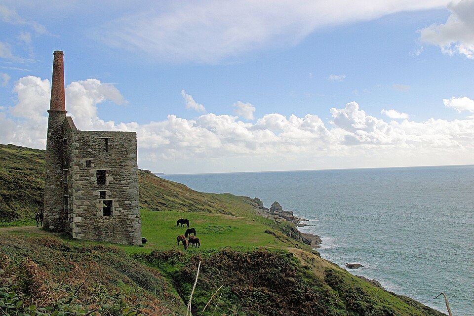 The ruined granite engine house at Wheal Prosper, on the cliffs at Rinsey, Cornwall.