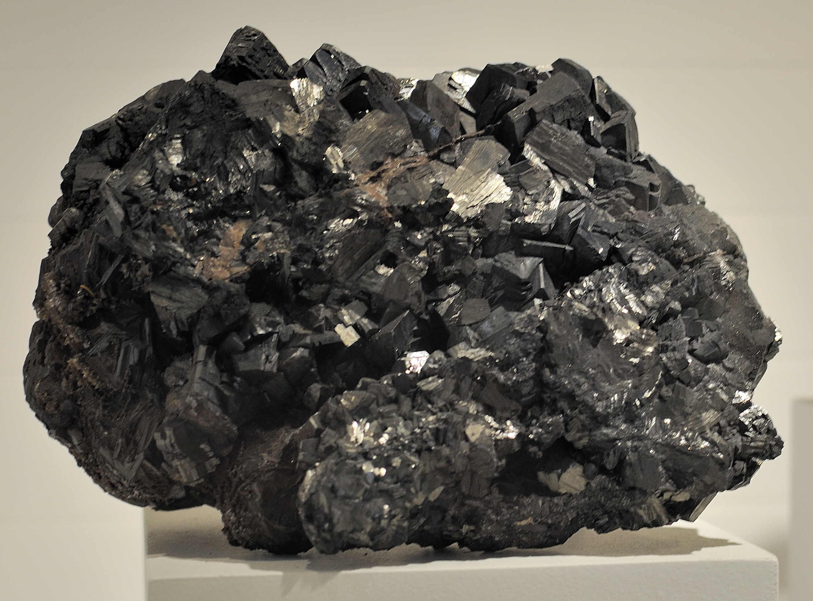 A metallic black pyrolusite specimen, the manganese oxide ore worked for both Victorian bleaching powder and, later, steelmaking.