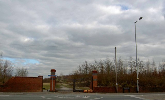 Gates carrying the National Coal Board name at the former Sutton Manor Colliery, now a country park.