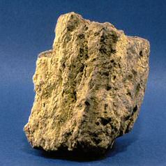 A sample of uranium ore, the source material from which South Terras's radium was painstakingly extracted a few grams at a time.