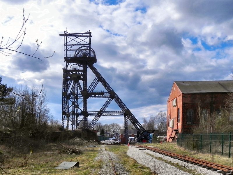 The preserved winding headgear and engine house at Astley Green Colliery, now a museum.