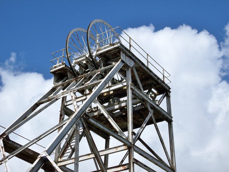 Steel headframe winding gear of the former Highhouse Colliery standing against the sky at Auchinleck.