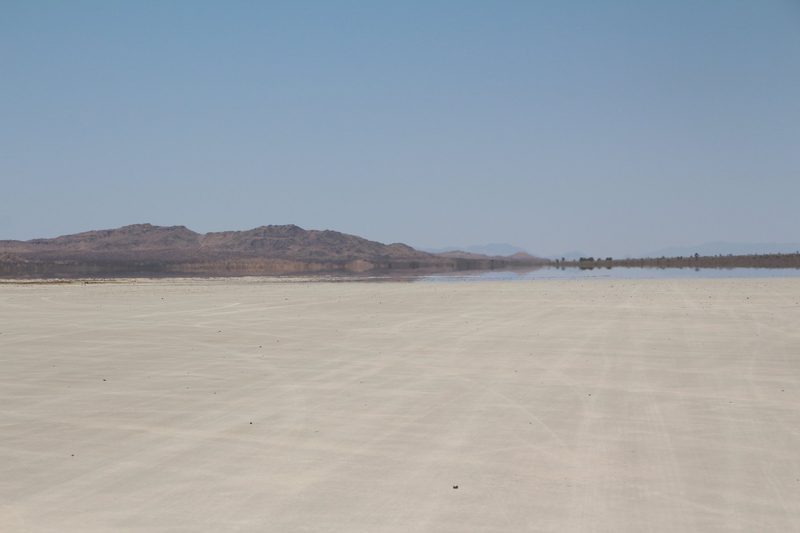 El Mirage dry lake bed, California — not Pentarus V or Lambda Paz themselves, but the real location used to film the desert moon's exterior in the TNG episode 'Final Mission'