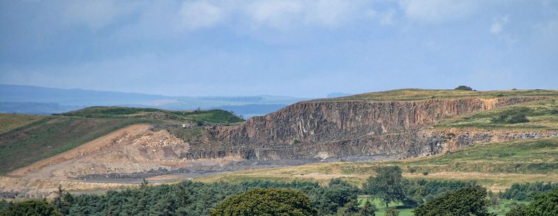 The working faces and plant of Barrasford Quarry, cut into the Whin Sill in the North Tyne valley.