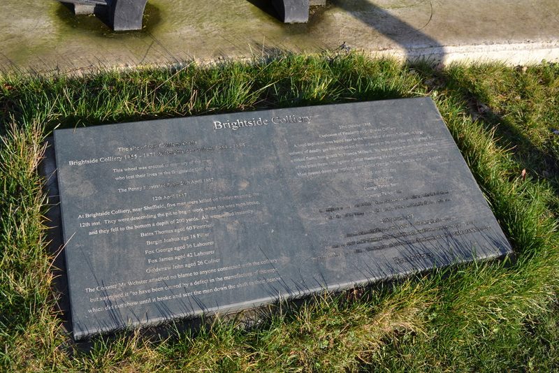 A dark stone plaque set in grass, headed Brightside Colliery, listing the men killed in 1865 and 1867.